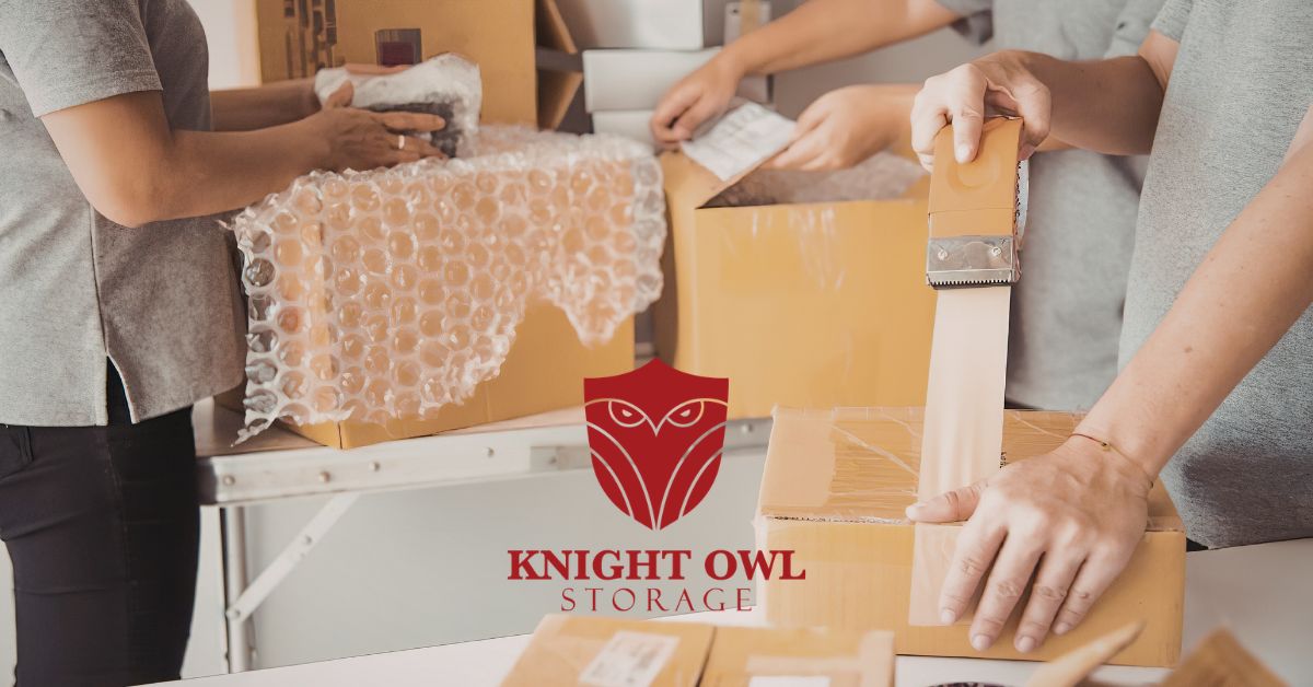 Knight Owl Storage Hwy 90 logo with moving boxes and U-Haul truck